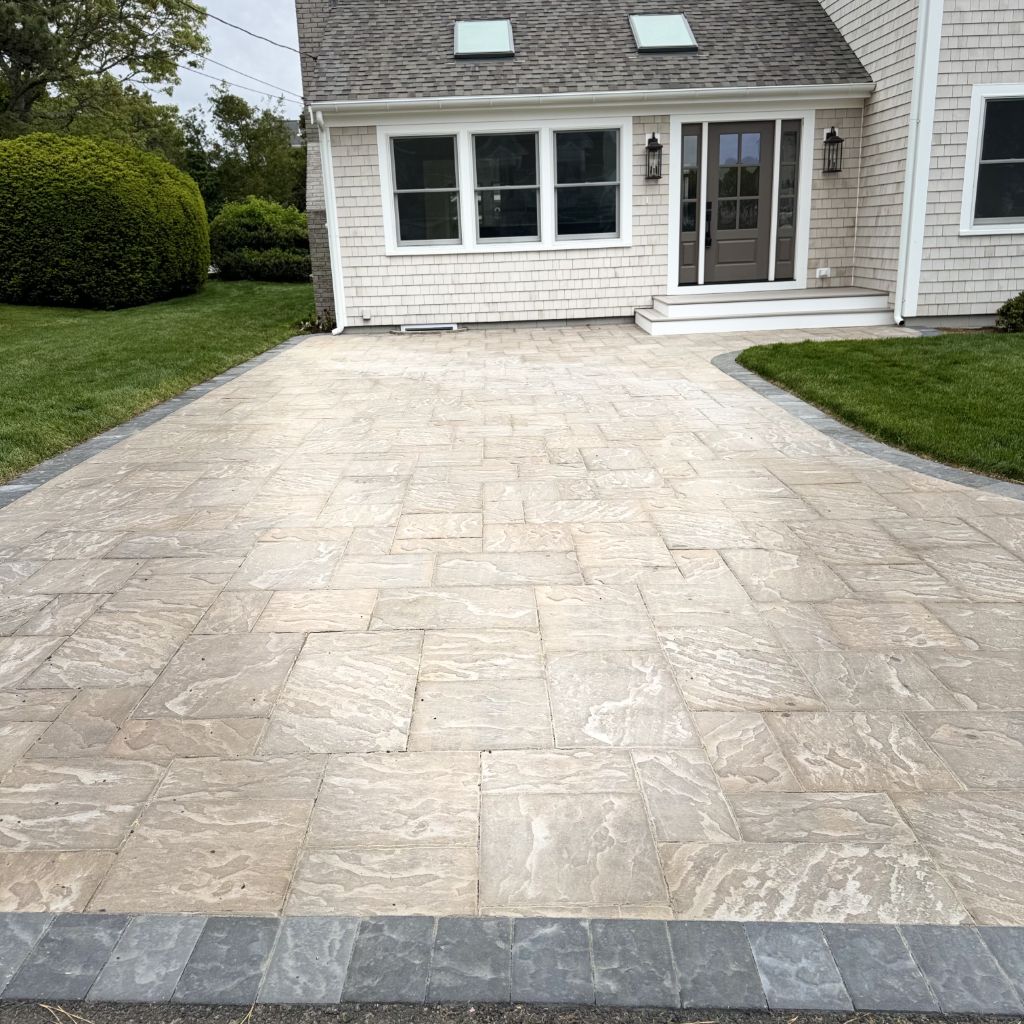 Premium paver driveway by Coast Masonry