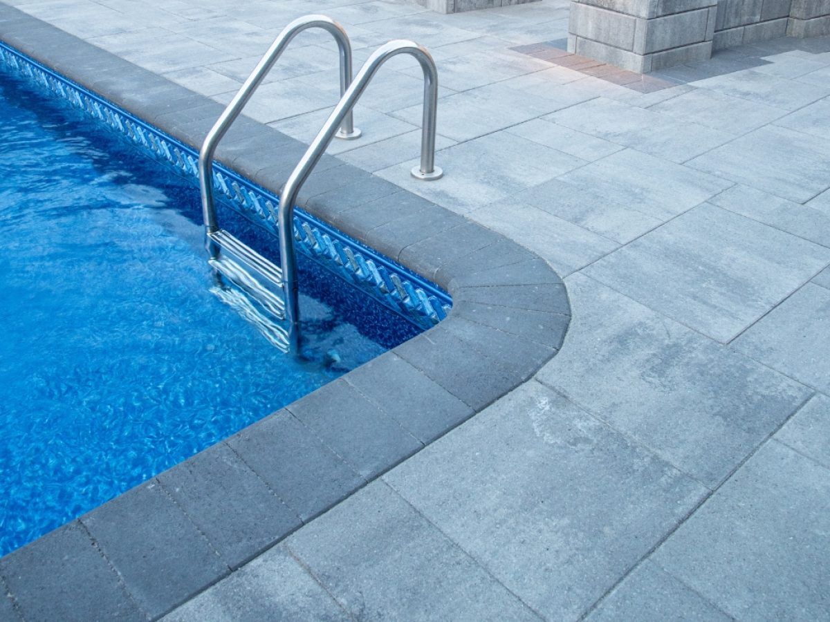 Pool deck paver installation